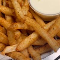 Old Bay Fries · With American cheese and Old Bay seasoning.