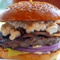 Wild Mushroom Burger · wild mushroom blend, caramelized
onions, goat cheese, horseradish
crema, seeded brioche