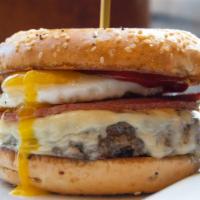 The Manhattan  Burger · crispy pork roll, cooper sharp American,
sriracha ketchup, sunny egg, toasted
everything bagel