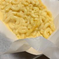 Kids Mac & Cheese · Creamy cheese sauce and macaroni.