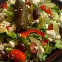 Mediterranean Salad* · Gluten Free. Vegetarian. Crispy Romaine Heart, Olives, Cucumbers, Tomatoes, Grape Leaves, Le...