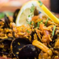 Paella* · Gluten Free. Byrsa Bistro Style Paella, Calamari, Clams, Mussels, Fish, Shrimp, Olives, Saff...