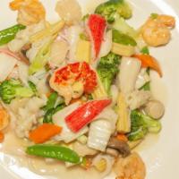 Seafood Delight · Shrimp, lobster, crab meat, and scallops sautéed with vegetables in white sauce.