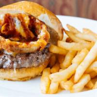 Westgate Burger · 8 oz burger, BBQ sauce, onions rings and cheddar on a brioche bun.