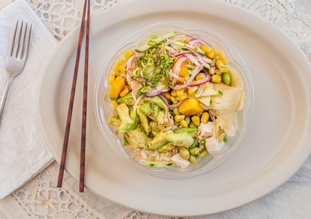 Vegetable Bowl · Tofu, seaweed salad, green onion, avocado, edamame, cucumber, mango, sweet onion, corn, ginger with house special soy and sesame ginger sauce.