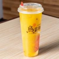 Mango Passion Oolong Tea · Fruits Include Mango, Lemon, Lime.