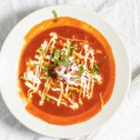 Chicken Tortilla Soup · Tomato-based soup with pulled chicken, spices, cheese, sour cream, cilantro, and tortilla st...