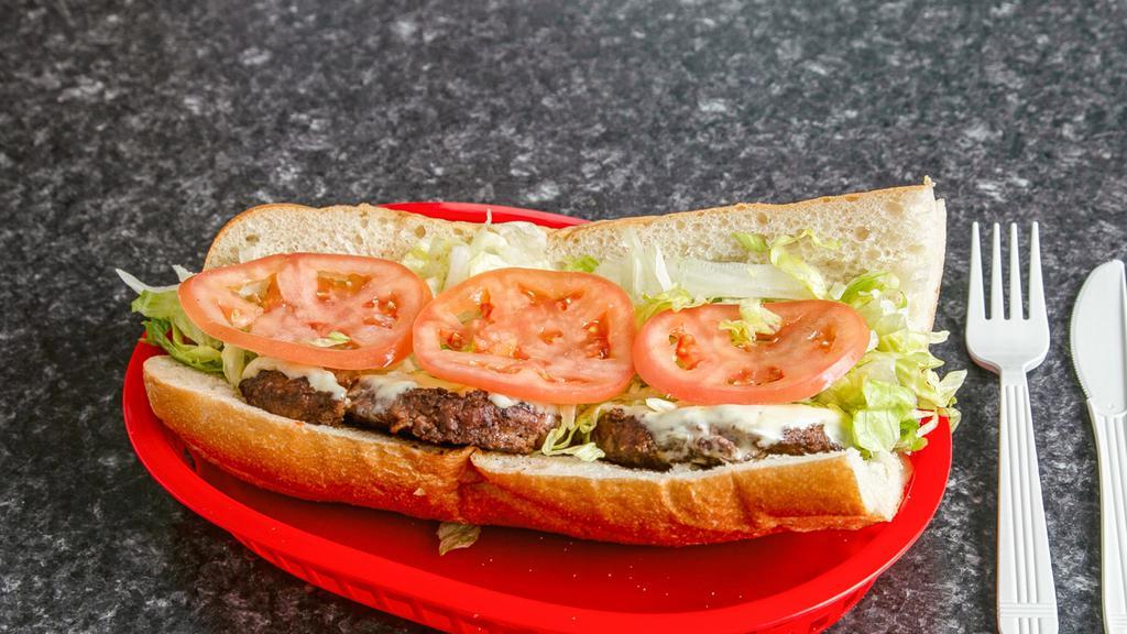 Cheeseburger Hoagie · Two cheeseburgers served on a 9-inch hoagie roll with lettuce, tomatoes and grilled onions.