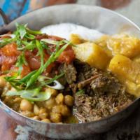 Curried Chicken With Veggie Bowl · Curried chicken with potatoes, channa and tomato choka. Includes jasmine rice and cucumber s...