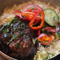 Trini Chinese Chicken Bowl · Includes jasmine rice and cucumber salad
