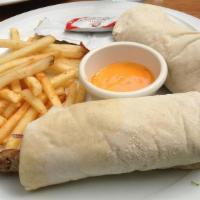Adana Sandwich · Skewered ground lamb and beef, wrapped in lavash bread.