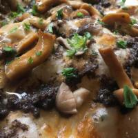 Tartufo E Funghi (Half Tray) (Exclusive Item)  · Imported Italian black truffle sauce,  mushrooms, mozzarella, and olive accents.