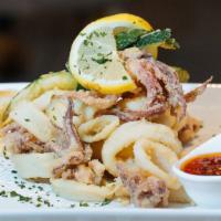 Calamari Fritti · Flash fried fresh calamari, zucchini, and spicy pomodoro dip.