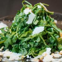 Arugula-Fennel Salad  · Wild Arugula, Shaved Fennel, Grape Tomato, Parmigiano Shavings, Zesty Vinaigrette