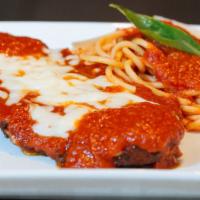 Pollo Parmigiano · Popular. Chicken cutlet, pomodorini, mozzarella, and mezzo manche pasta.