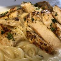 Chicken Alfredo · Over pasta grilled chicken over a bed of pasta in a cheesy alfredo cream sauce.
Choice of Li...