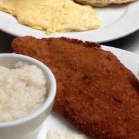 Fish, Grits & Eggs · Flounder filet fried with panko breading with two eggs and a cup of grits.