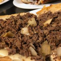 Philly Cheesesteak · Chopped sirloin steak with choice of cheese.