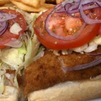 Fried Flounder Hoagie · On a long roll with lettuce, tomato, onion and tartar sauce.