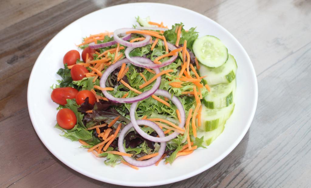 Garden Salad · Mixed greens, tomatoes, cucumber, carrot, red onion, balsamic