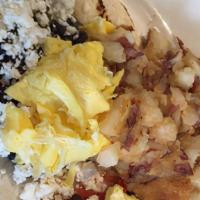 Zoe'S Huevos Rancheros · Two eggs any style, black beans, jalapenos, tomatoes, and feta cheese on a tortilla.