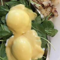 Florentine Benedict · Two dropped eggs, spinach, and grilled tomato on an english muffin, topped with hollandaise ...