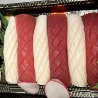 Tuna Lover · Three pieces of tuna sushi, three pieces of white tuna sushi, with tuna or spicy tuna roll.