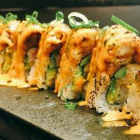 Volcano Roll · Spicy. Shrimp tempura, cucumber inside with seared spicy tuna on top, with spicy mayo sauce.