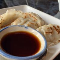 Gyoza (6) · Steamed or Fried. Pork and vegetable dumplings served with sweet ginger sauce.