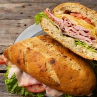Italian Sub Sandwich · Delicious combination of Italian deli meats including mortadella, salami, pepperoni, served ...