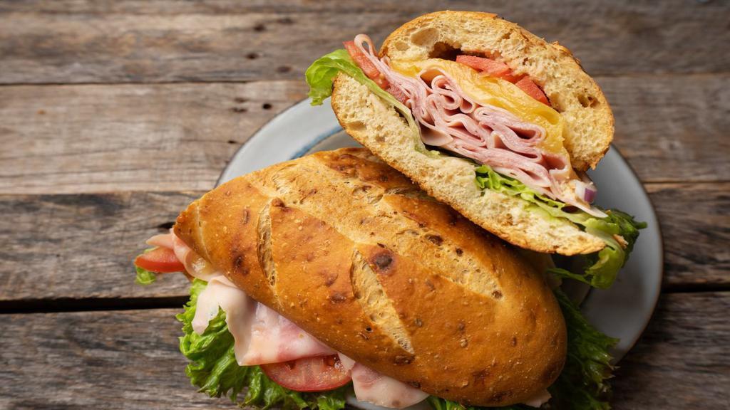 Italian Sub Sandwich · Delicious combination of Italian deli meats including mortadella, salami, pepperoni, served on a long, soft roll. Your choice of toppings.