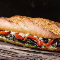 Eggplant Sub Sandwich · Breaded, golden fried eggplant cutlet, served on a long, soft roll. Your choice of toppings.
