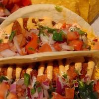 Tacos Fritos / Fried Tacos · Pollo o carne de res servida con ensalada y salsa rosa. / Chicken or beef served with salad ...
