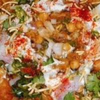 Samosa Chaat · Samosa chaat is a tangy, spicy, and crispy delicious Indian street food where samosa is mash...