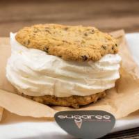 Baumwich · Two toffee and chocolate chip cookies sandwiched between vanilla ice cream.