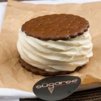Ice Cream Sandwiches · Two chocolate wafer cookies between vanilla or chocolate ice cream.