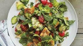 Fattoush Salad · Mixed greens served with cucumber, onions, tomato, croutons, and feta cheese.