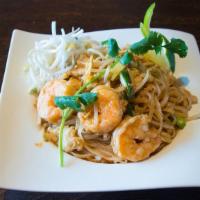 Pad Thai · Thailand's best-known noodle dish, rice noodles with shrimp, chicken, and egg. Green onions,...