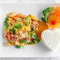 Mango Chicken · Stir-fried white meat chicken with bell peppers, red onion, and carrots in light brown sauce...