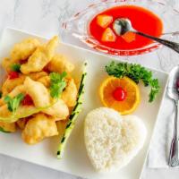 Sweet & Sour Chicken · Deep fried white meat chicken with red onion and bell peppers. Served with pineapple sweet-s...