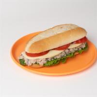 Tuna Sandwich · Tuna salad, tomato, lettuce, and onion on an Italian roll.