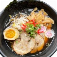 Shoyu Ramen  · Light soy sauce soup, ramen with chashu pork belly, marinated soft boiled egg, fish cake, be...