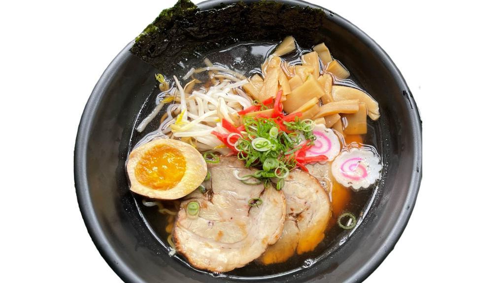 Shoyu Ramen  · Light soy sauce soup, ramen with chashu pork belly, marinated soft boiled egg, fish cake, bean sprouts, bamboo shoot, ginger, scallion and nori.