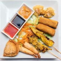 The Appetizer Sampler · A combination of our favorite appetizers such as chicken satay, curry puff, crispy spring ro...