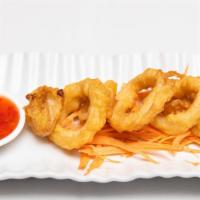 Fried Calamari · Fresh squid rings fried until light brown, served with sweet chili sauce.