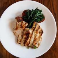 Grilled Marinated Chicken  · grilled broccolini, roasted red bliss potatoes, lemon roasted garlic butter