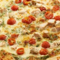 Chicken Pesto Pizza · grilled chicken, basil pesto, oven dried  tomato & mozzarella cheese