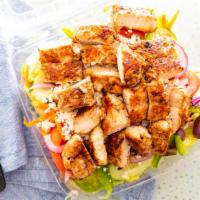 Chicken Salad · Flavorful mix of chicken breast and mayo on a bed of crispy iceberg lettuce, shredded red ca...