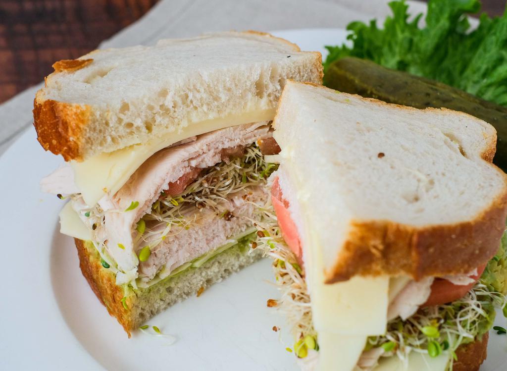 East Coast Sandwich · Roasted turkey, avocado, Swiss, mayo, sprouts, and tomato.