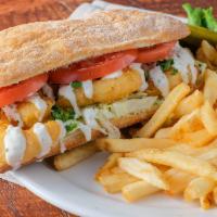 Shrimp Po’ Boy Sandwich · Eight spicy fried shrimp, lettuce, tomato, remoulade, lime crema on ciabatta.